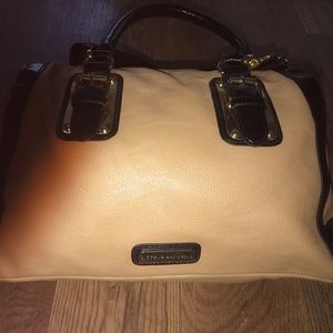 Tan and black handbag